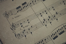 a sheet of music with musical notes on it