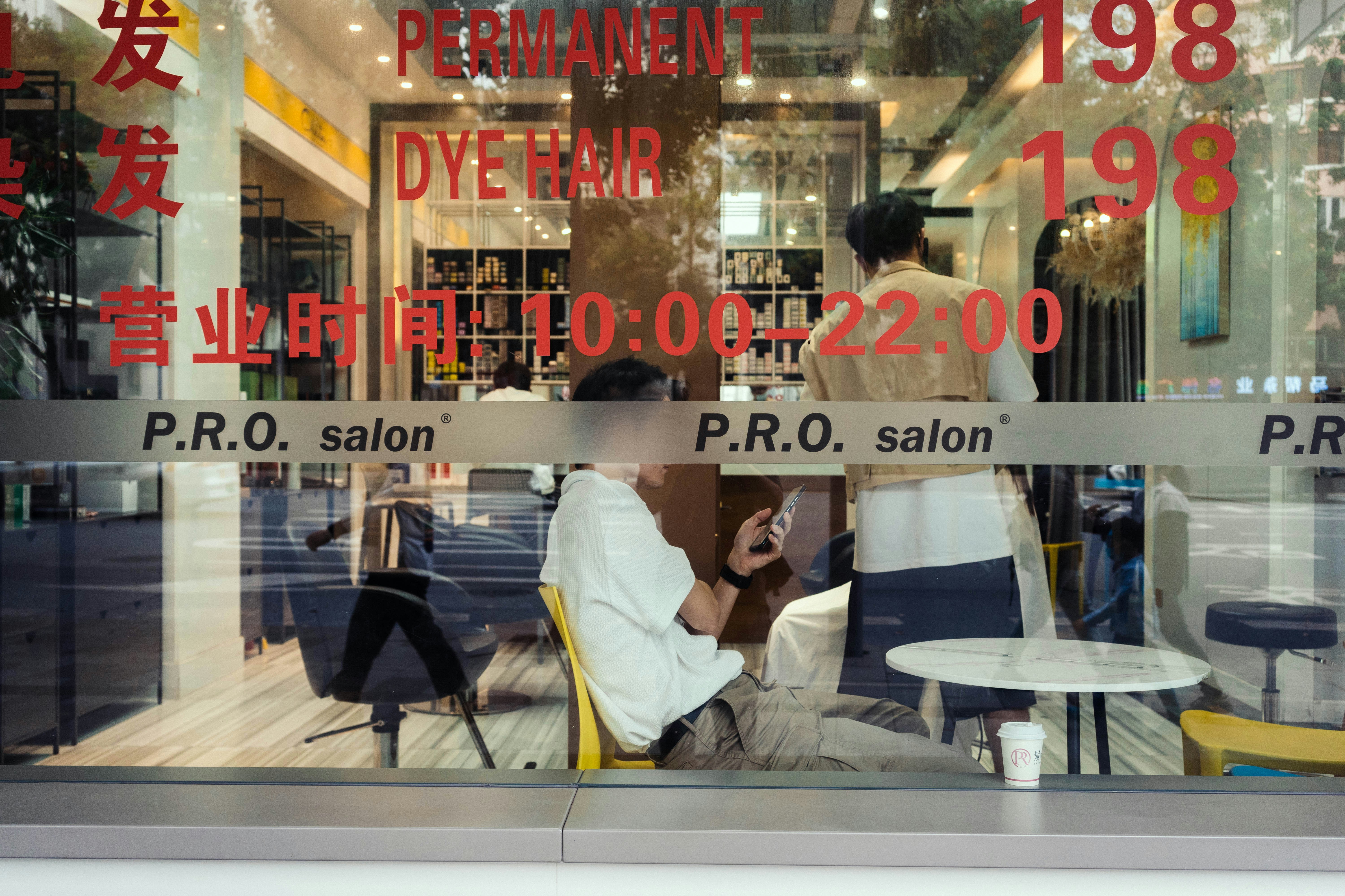 Price list for hair extension services at a local salon