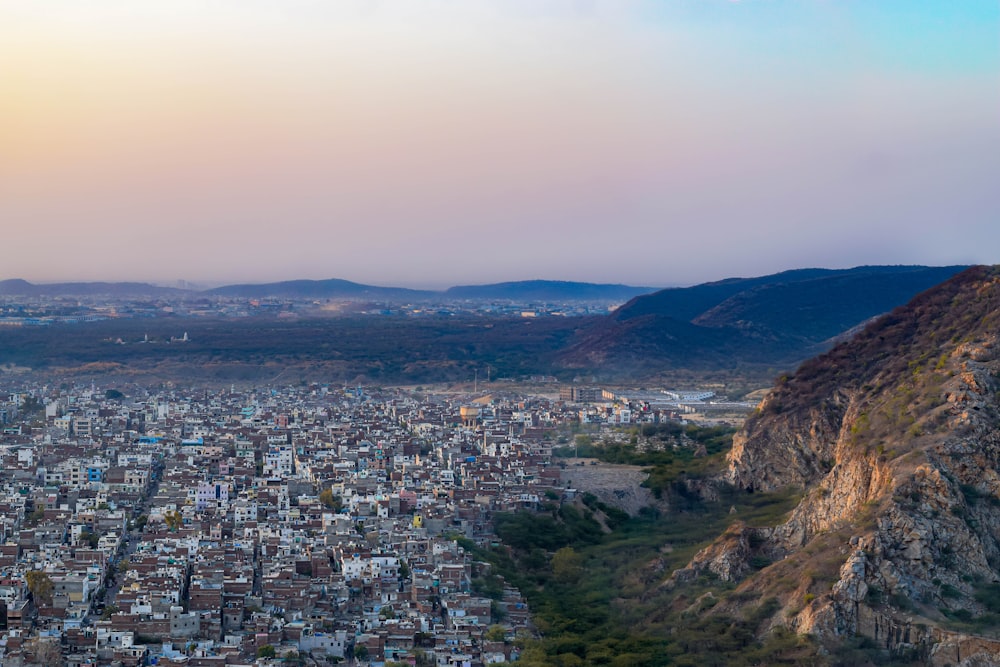 a view of a city from the top of a mountain