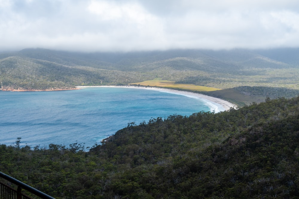 a view of the ocean from a hill