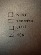 Close-up of a checklist with pet care tasks and a paw print stamp.
