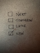 Close-up of a checklist with completed tasks marked, symbolizing progress and commitment.
