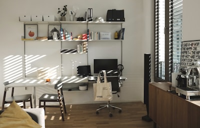 A neatly organized office corner with a used desk and ergonomic chair.