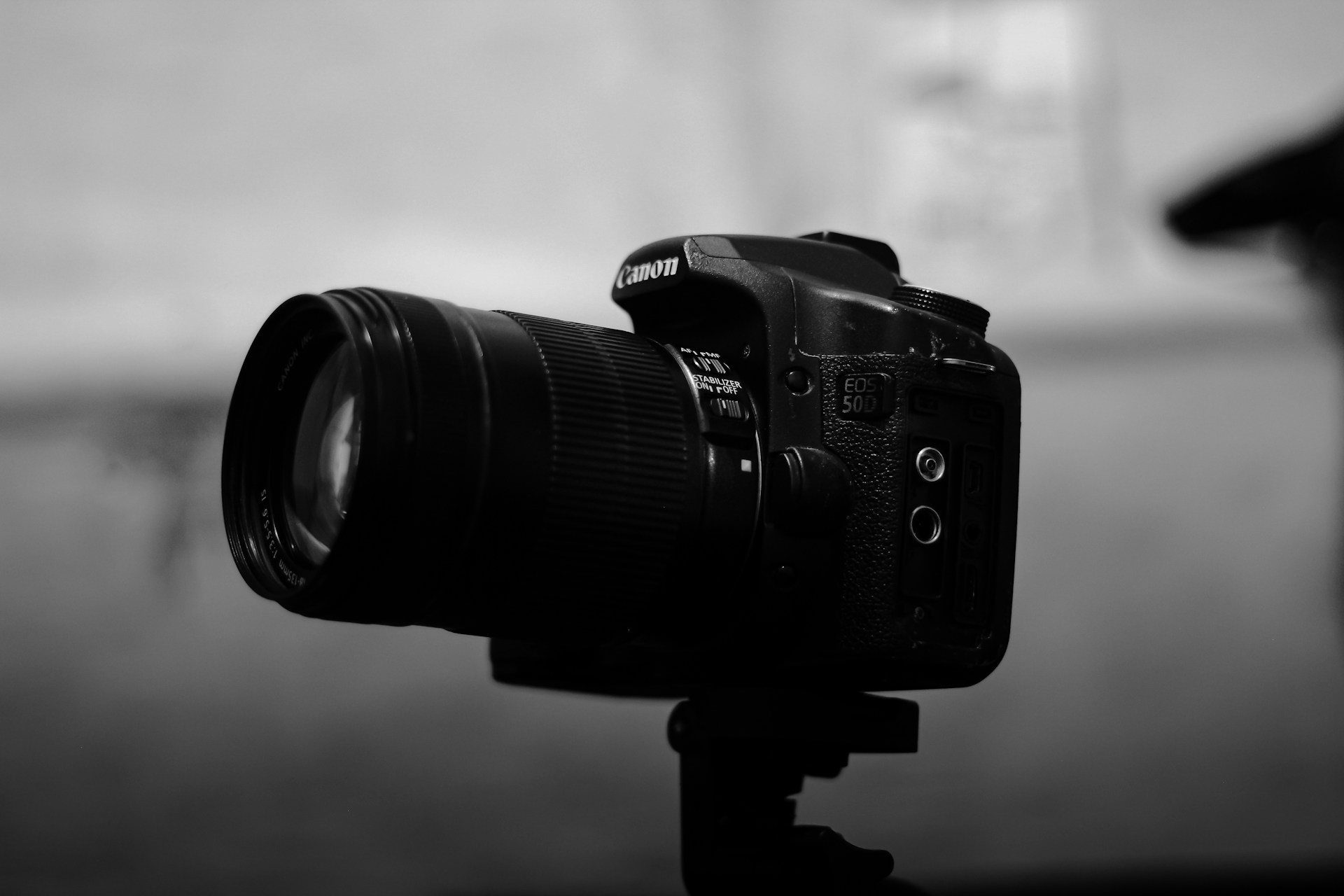 a camera sitting on top of a tripod