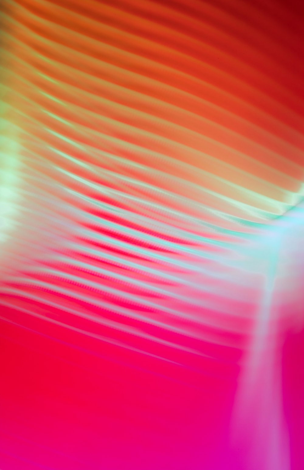 a blurry image of a red and pink background