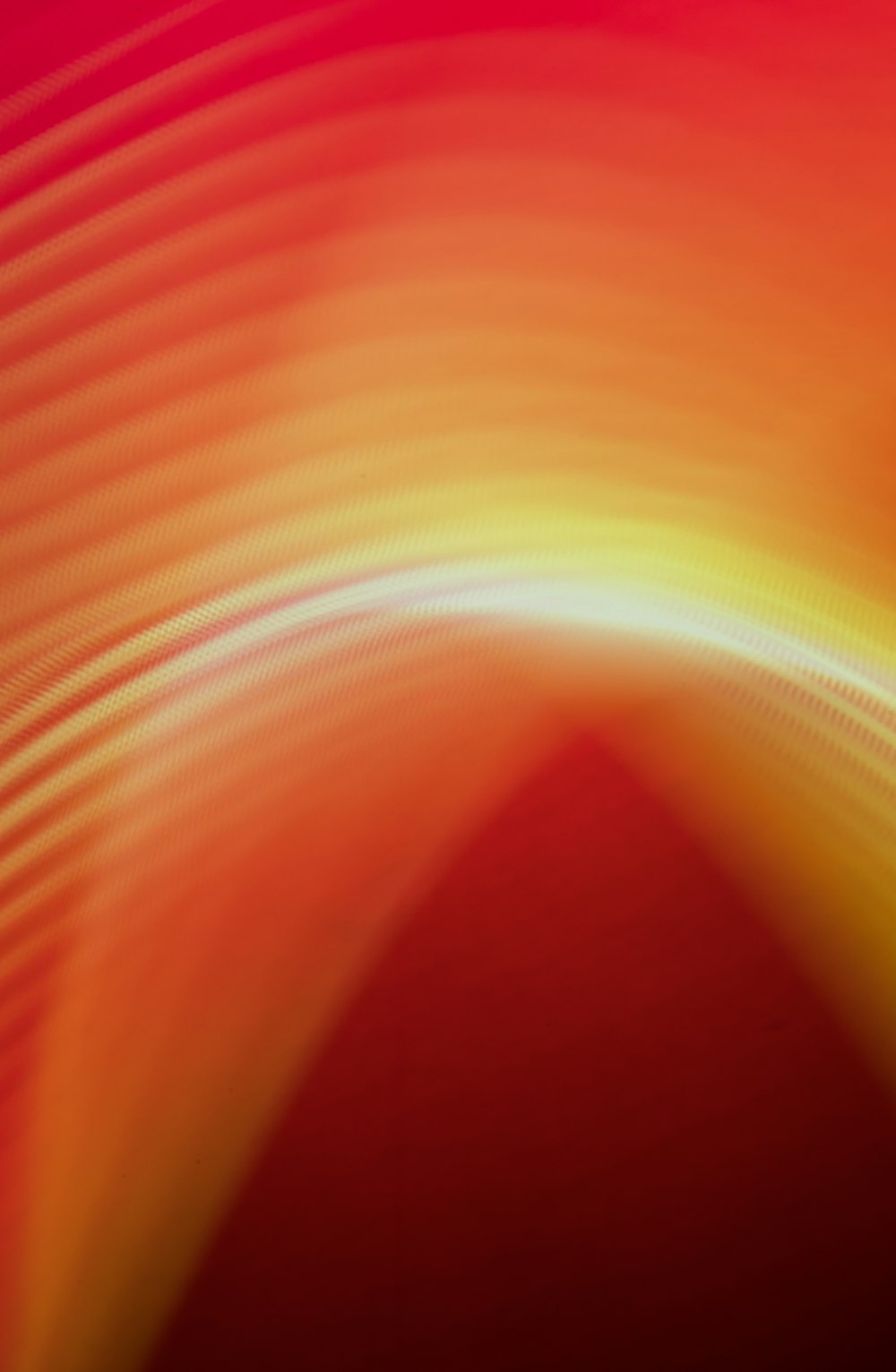 a red and yellow background with a black background