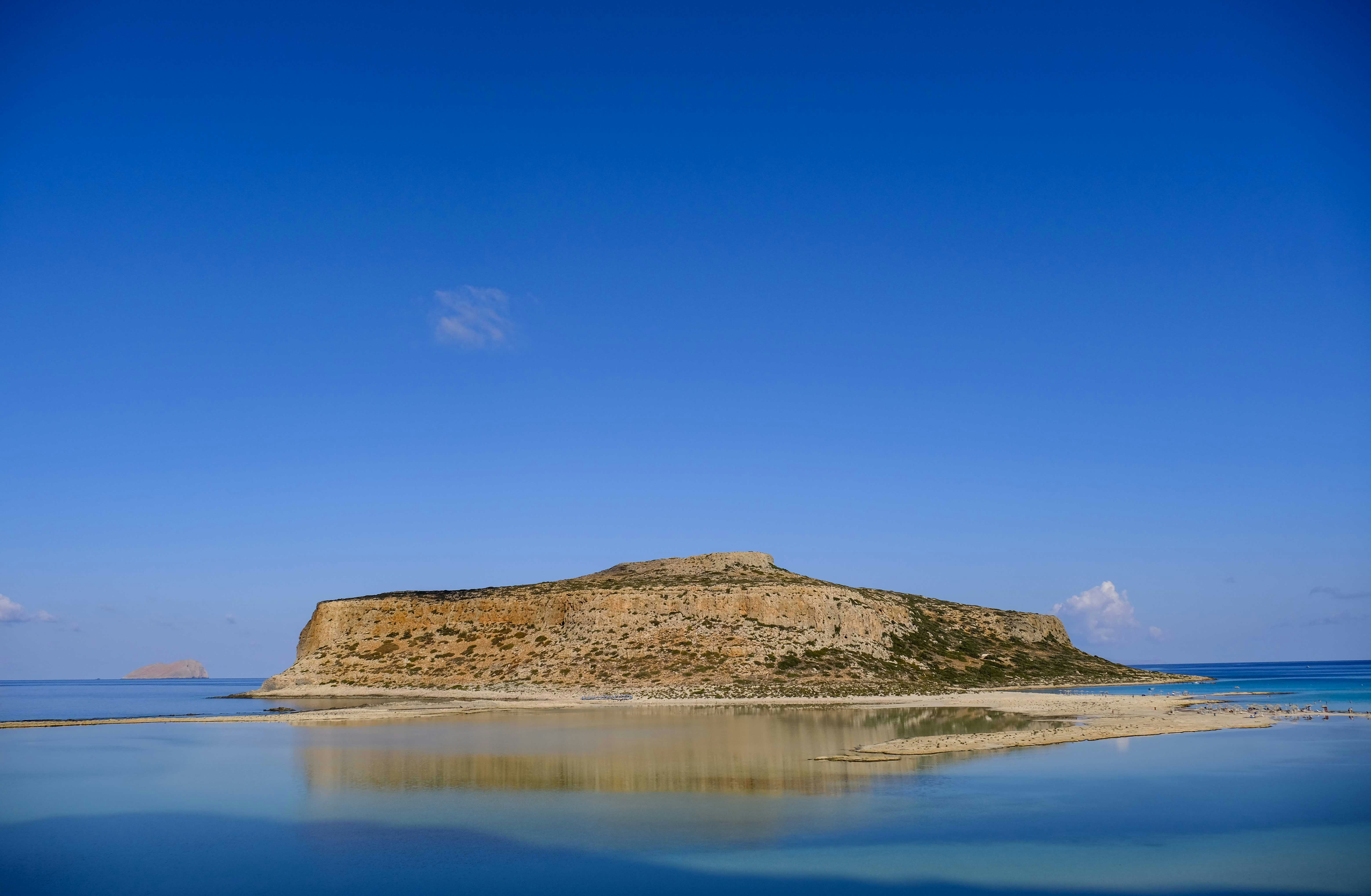 a small island in the middle of a body of water