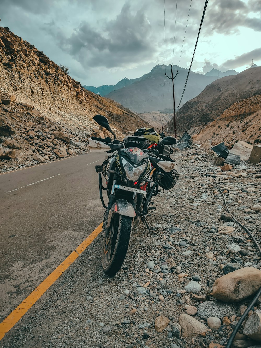 a motorcycle parked on the side of the road