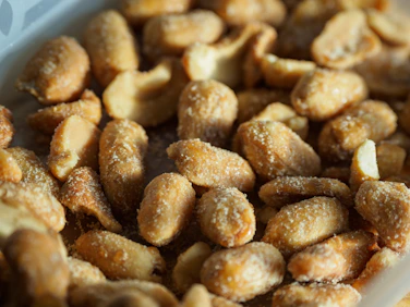 a close up of a bowl of nuts