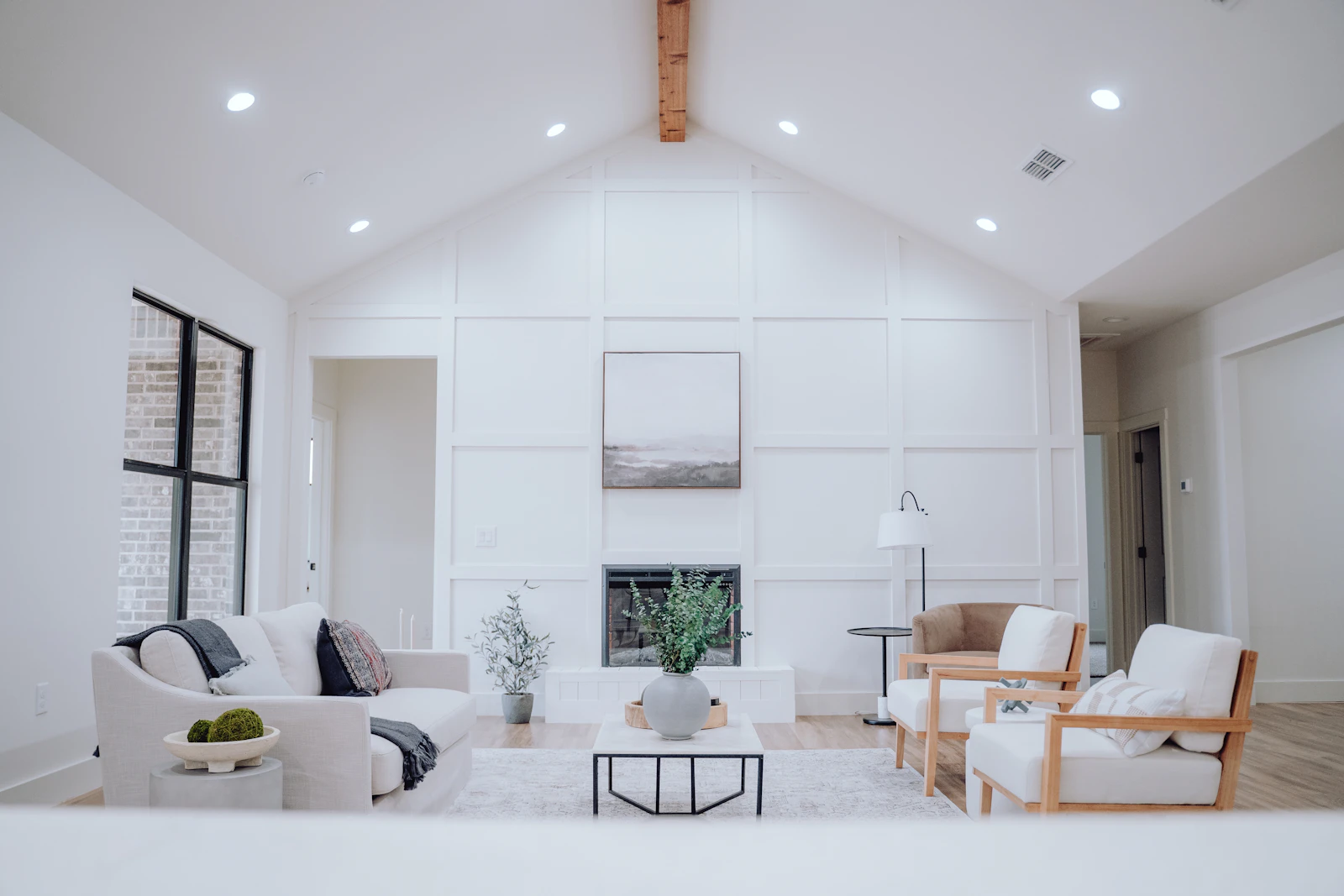 Living room with furniture and a fireplace nook