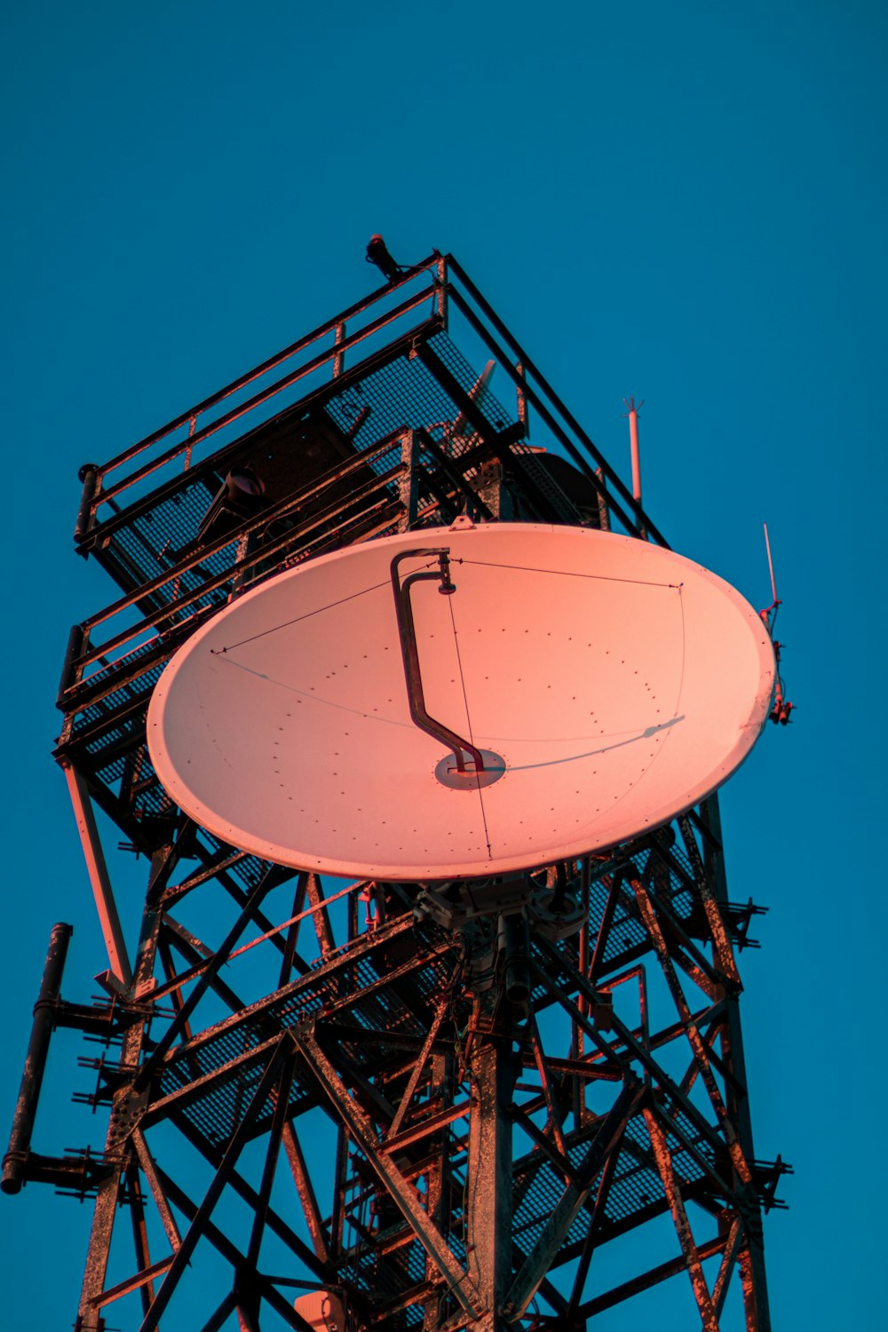 a very tall tower with a very large satellite dish on top of it