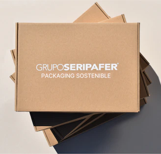 Food contact packaging boxes ready for shipment on pallets.