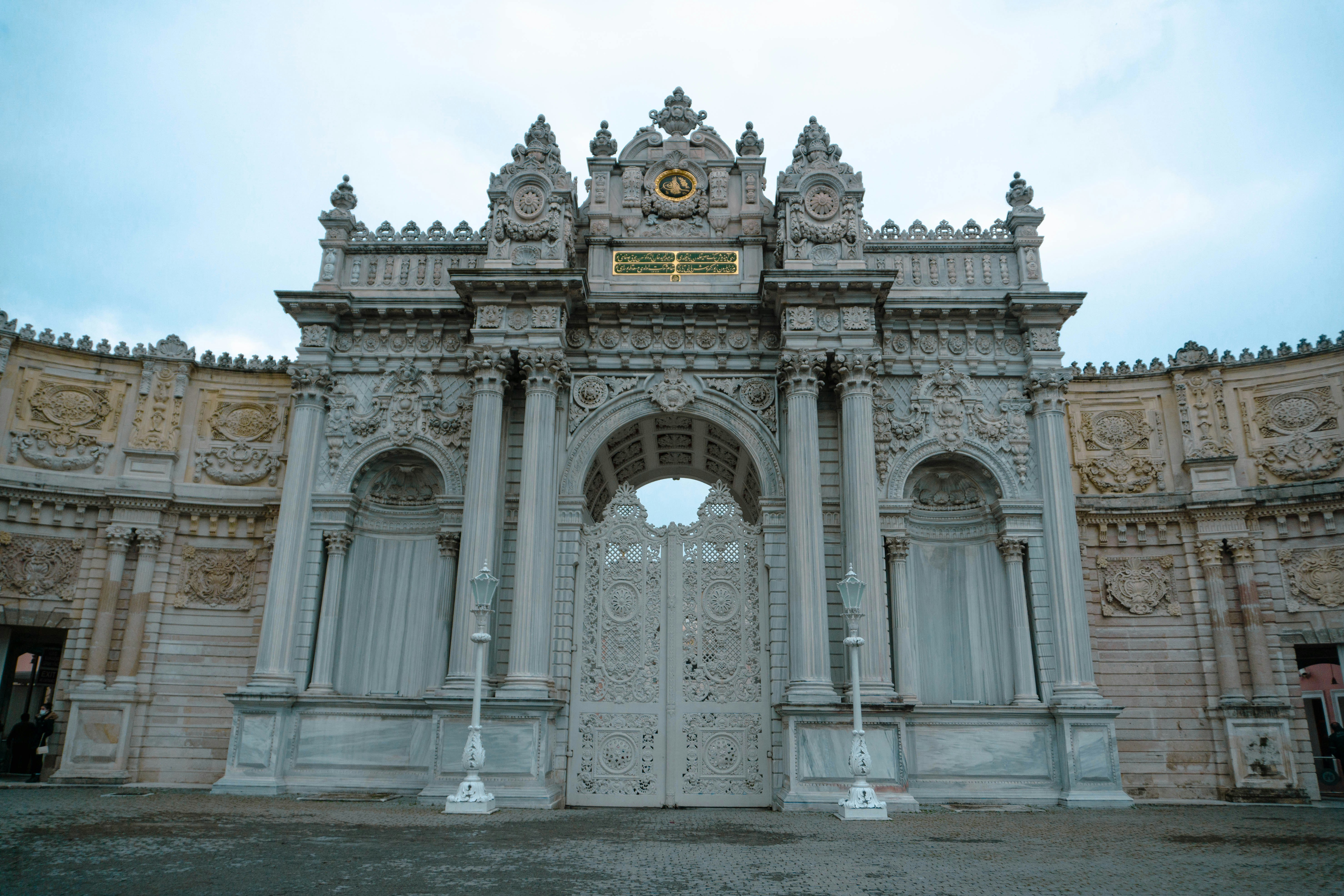 a large white building with a clock on top of it