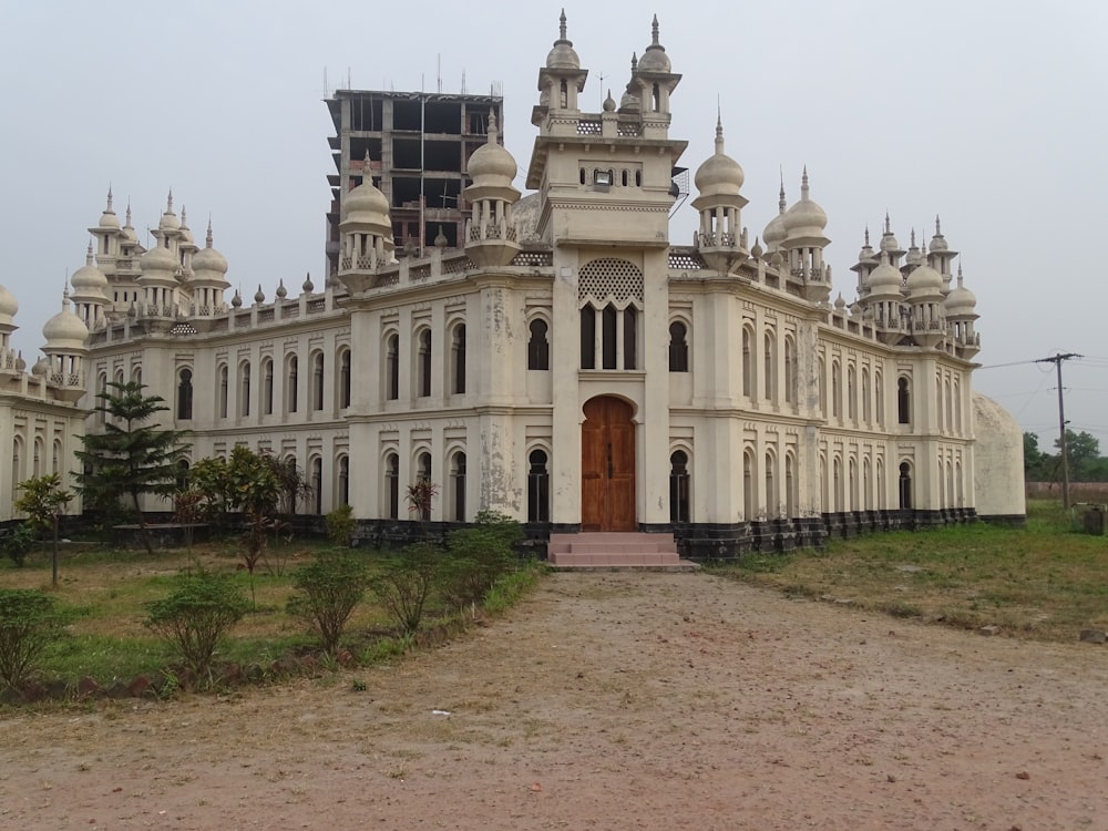 a large white building with lots of windows