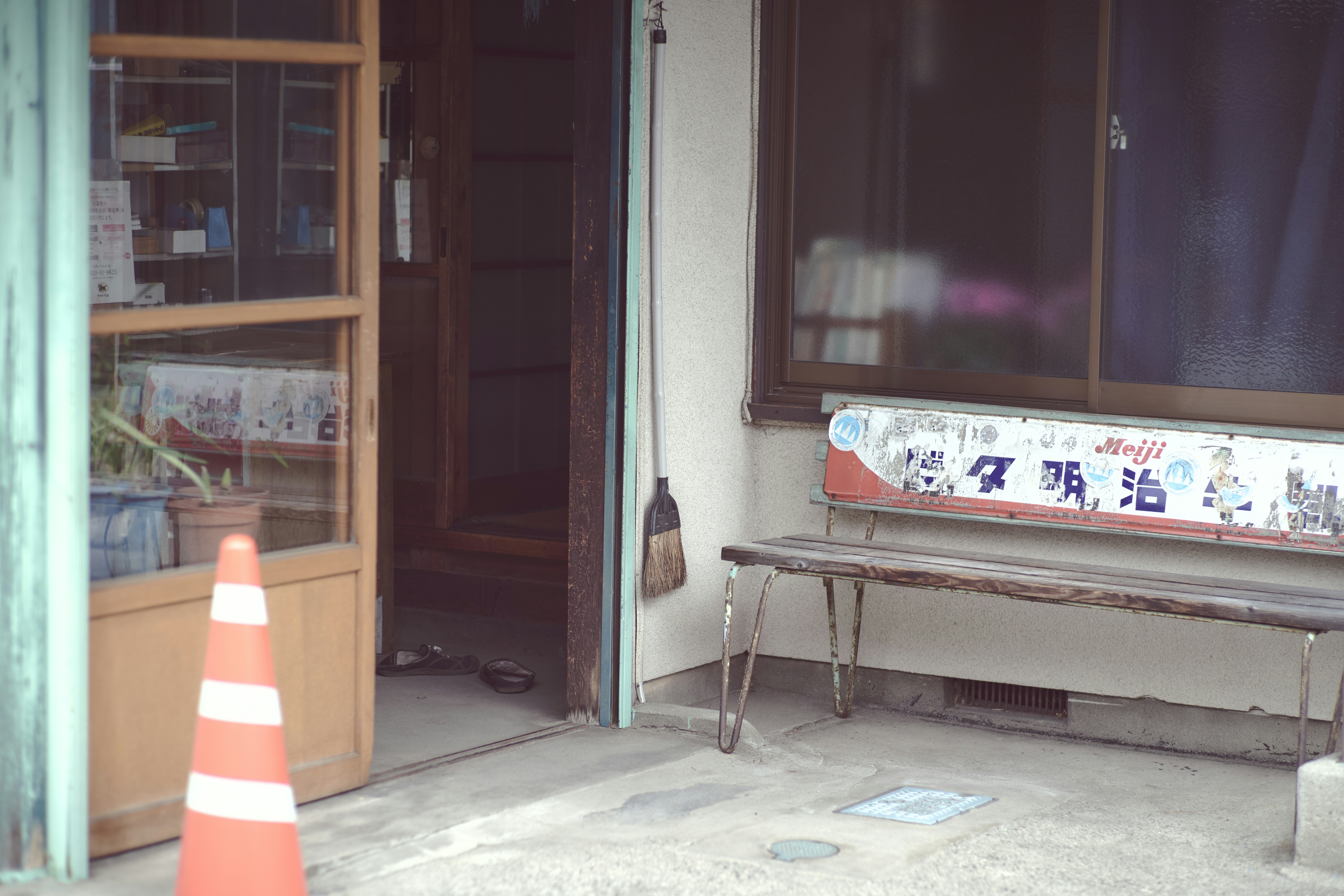 Person under a desk during an earthquake drill