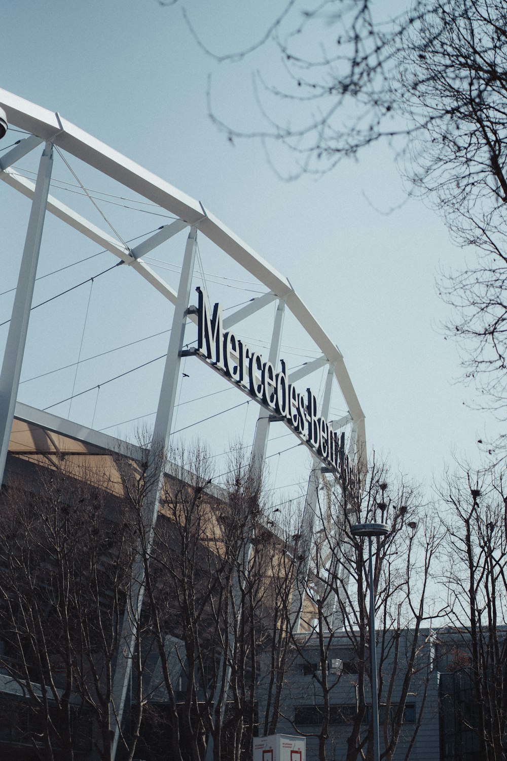 a large metal structure with a sign on it