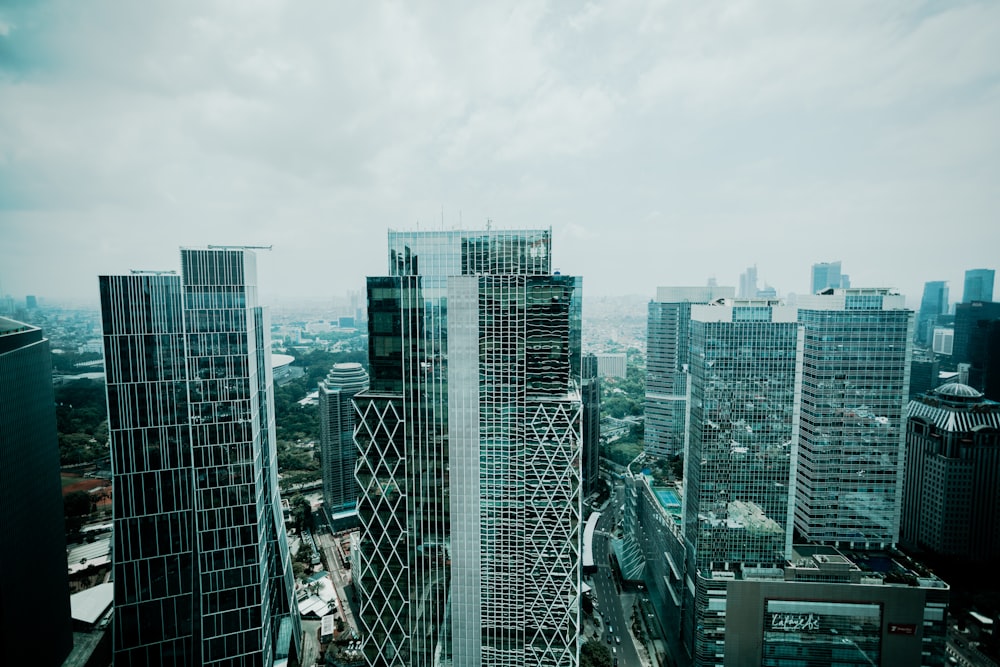 a group of tall buildings in a city