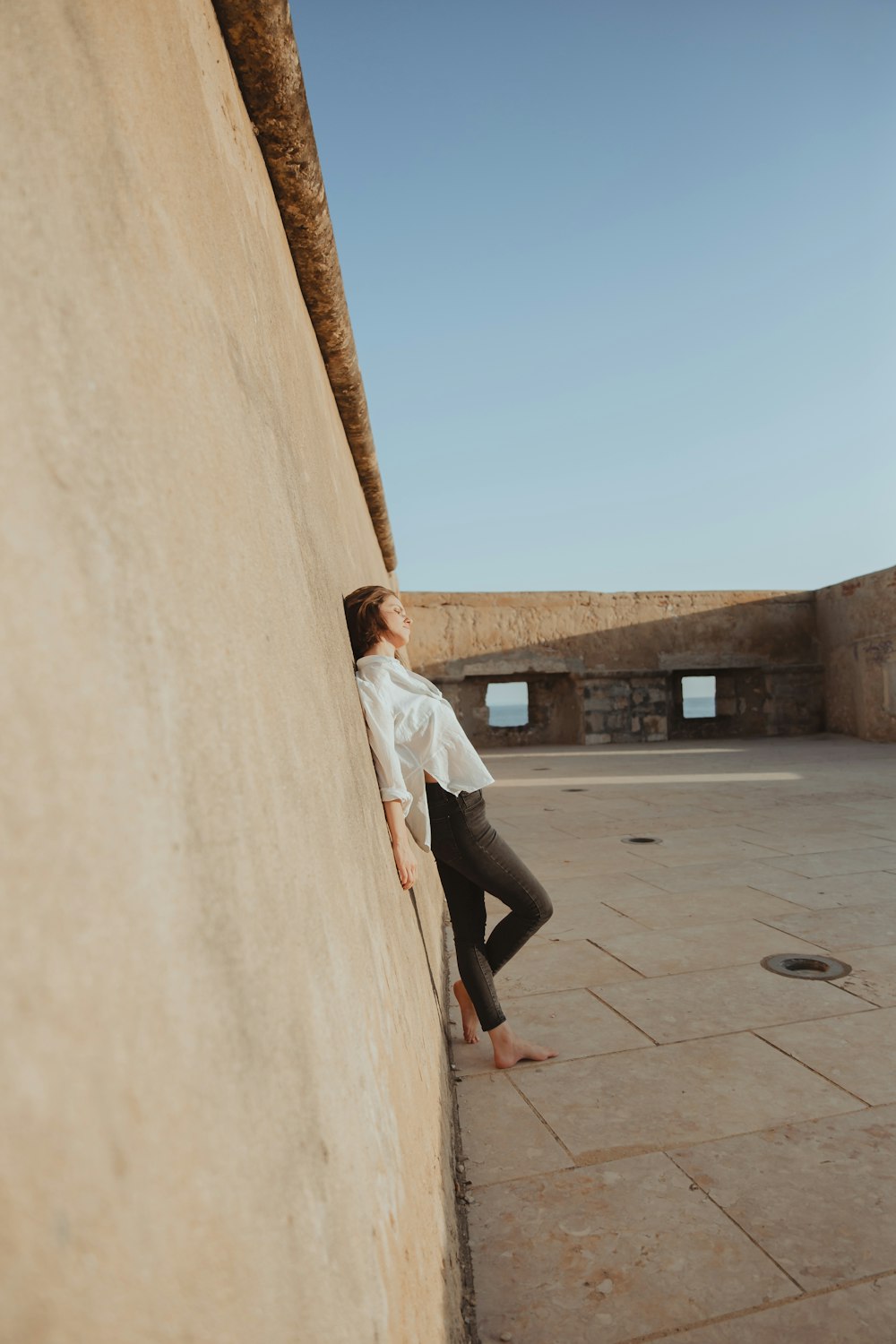 a man riding a skateboard down the side of a ramp