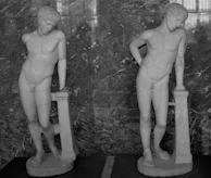 Ancient Greek statue depicting the mythological twins Castor and Pollux side by side.