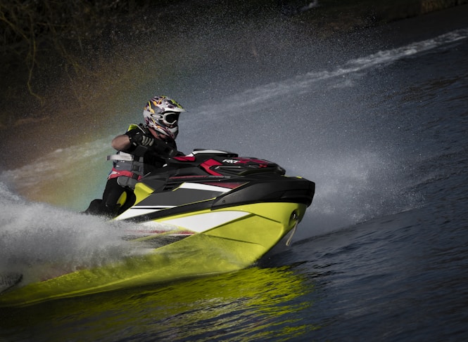 a man riding a jet ski in the water