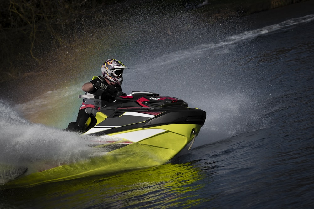 a man riding a jet ski in the water