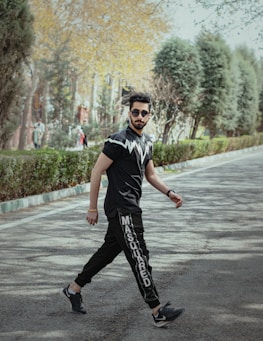 An urban setting featuring a person confidently walking in gravv apparel, blending fitness with everyday life.