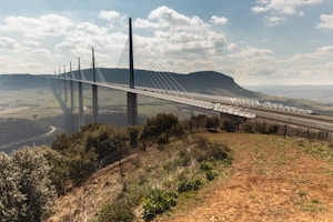 a bridge with a train going over it