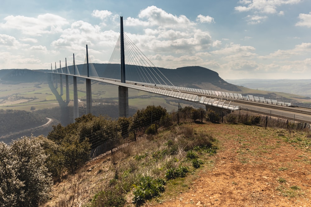 a bridge with a train going over it