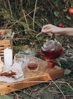 A tranquil scene of a person enjoying tea outdoors.