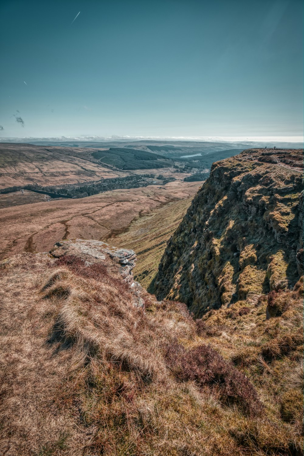 a rocky outcropping in the middle of a field