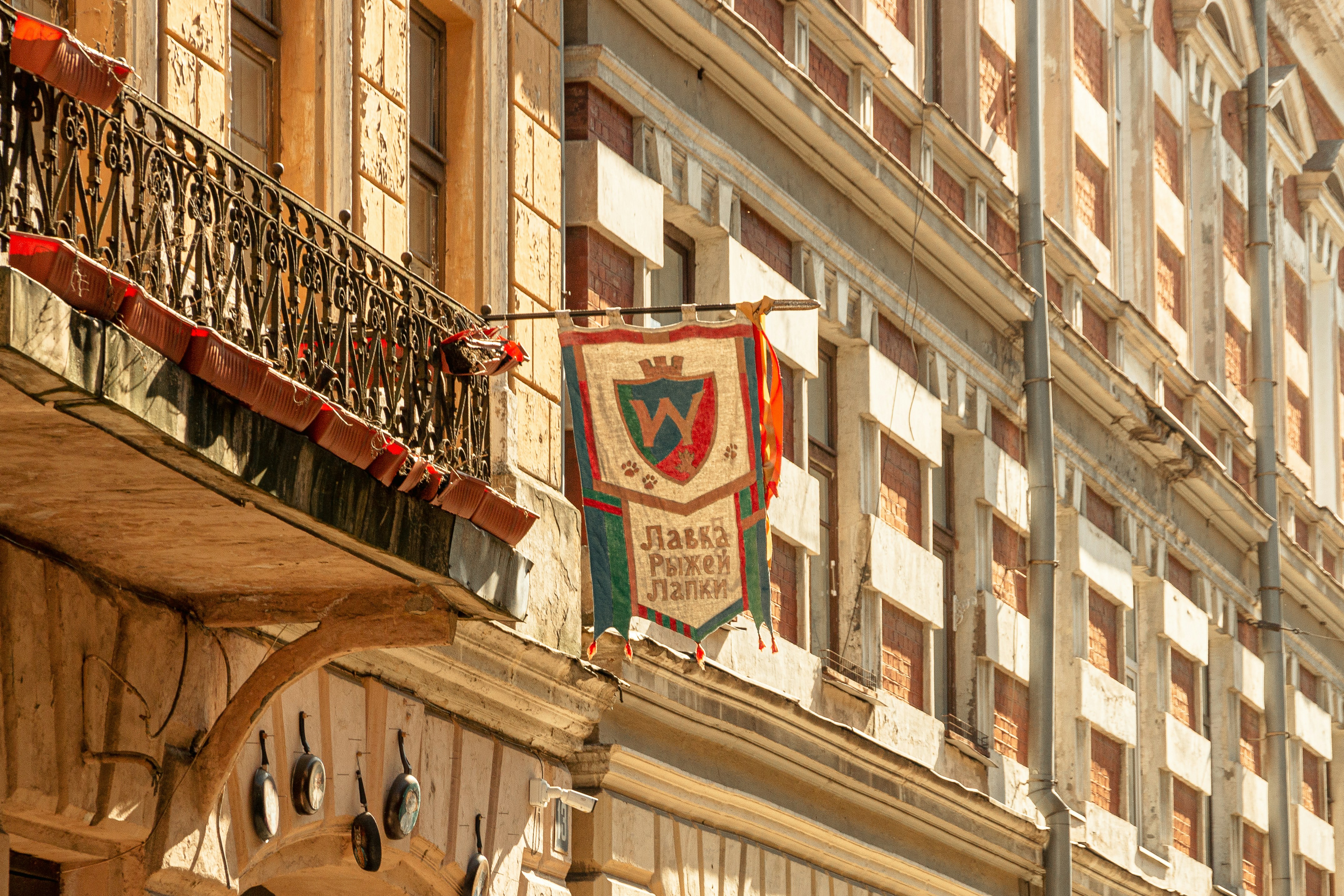 a building with a flag hanging from it's side