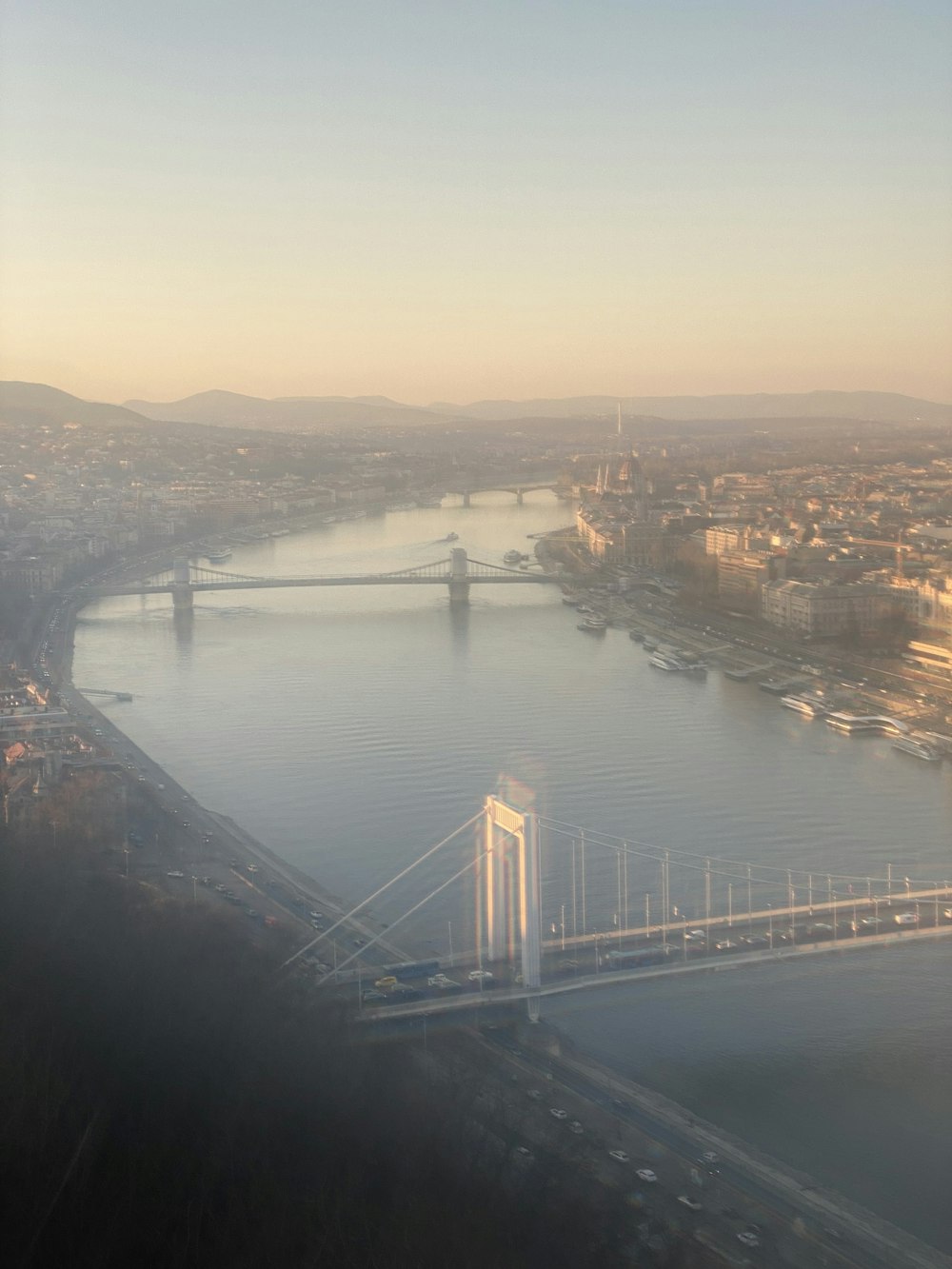 a view of a bridge over a large body of water