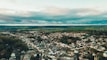 an aerial view of a city with a river running through it