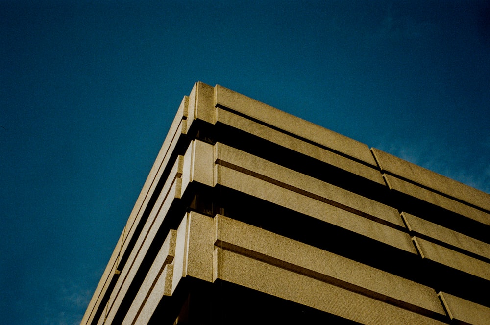 a tall building with a clock on the top of it