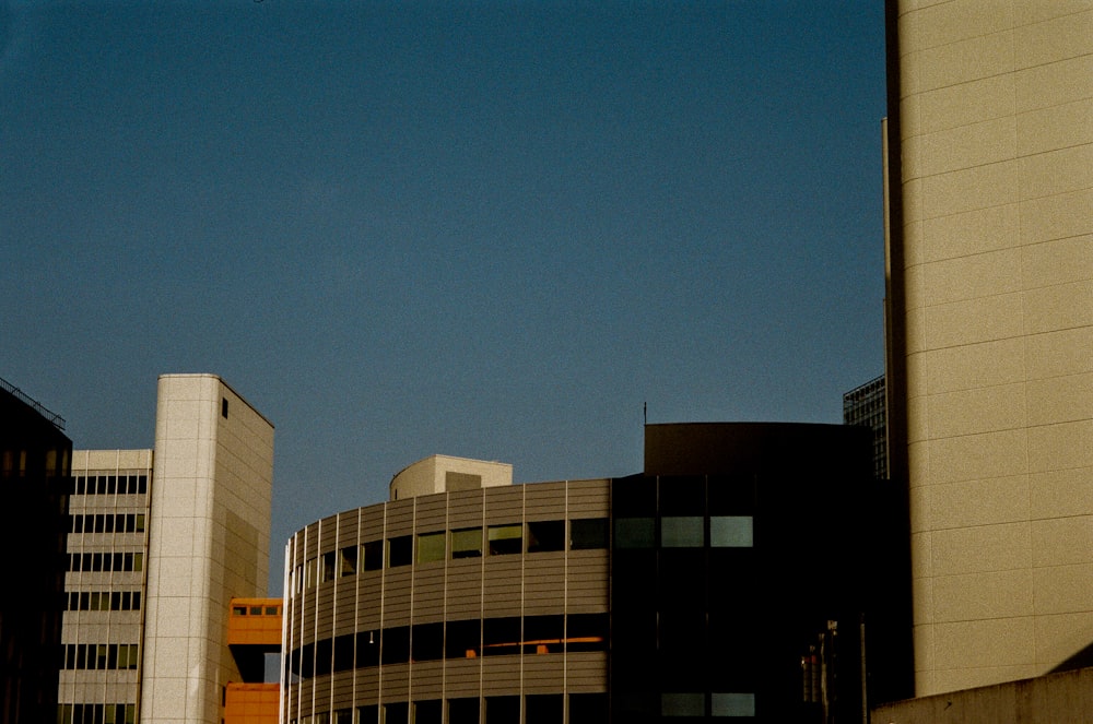 a large building with a clock on the side of it