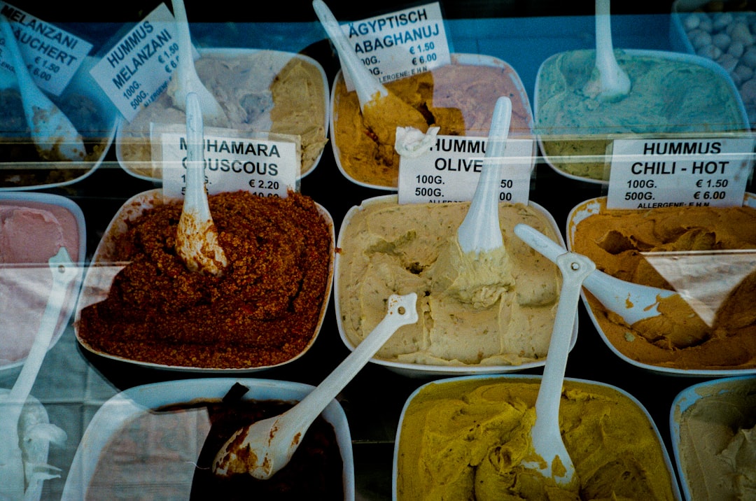 a display of hummus, hummus chili, hummus hot, hummus