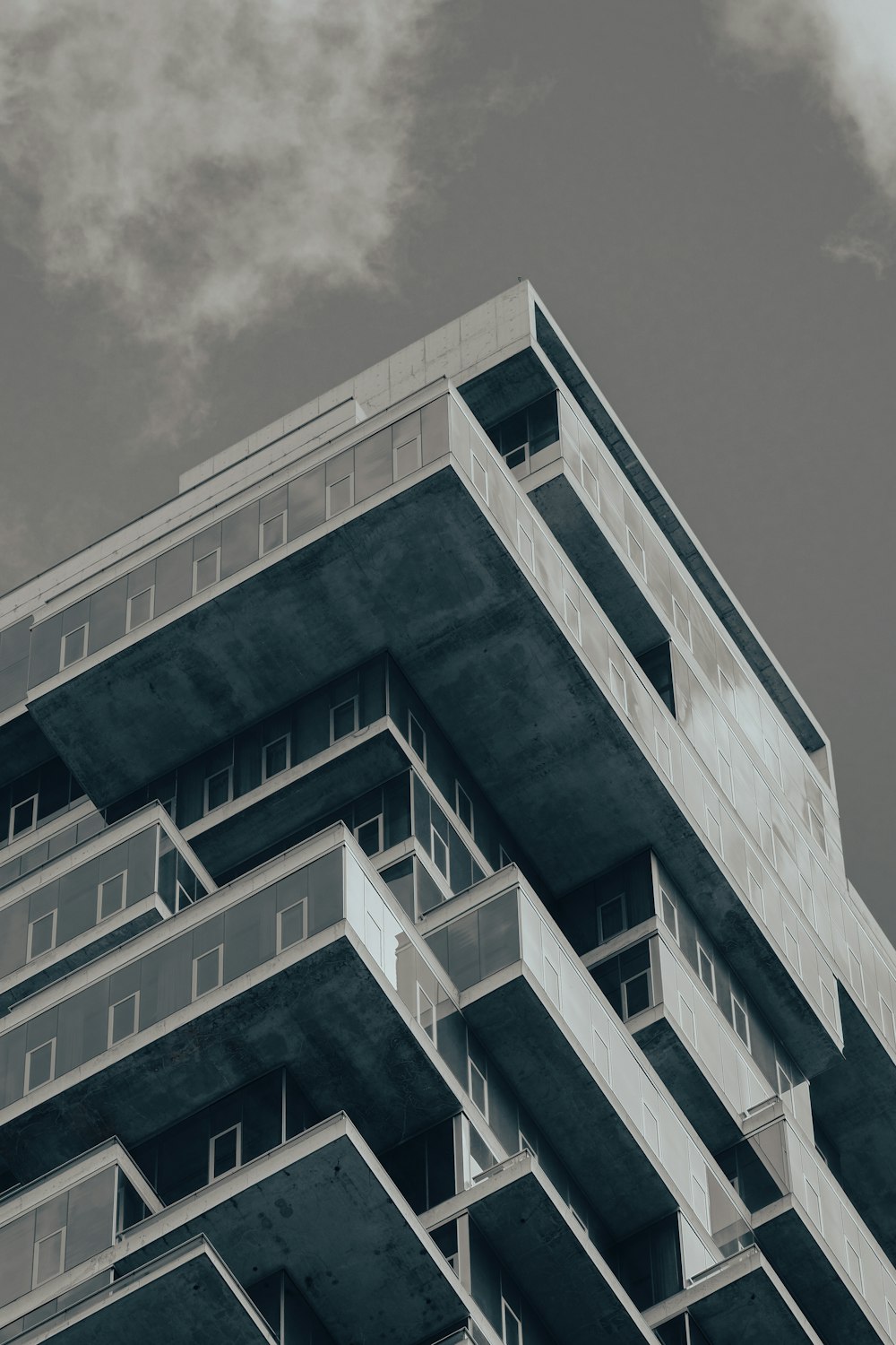 a tall building with balconies and balconies on it