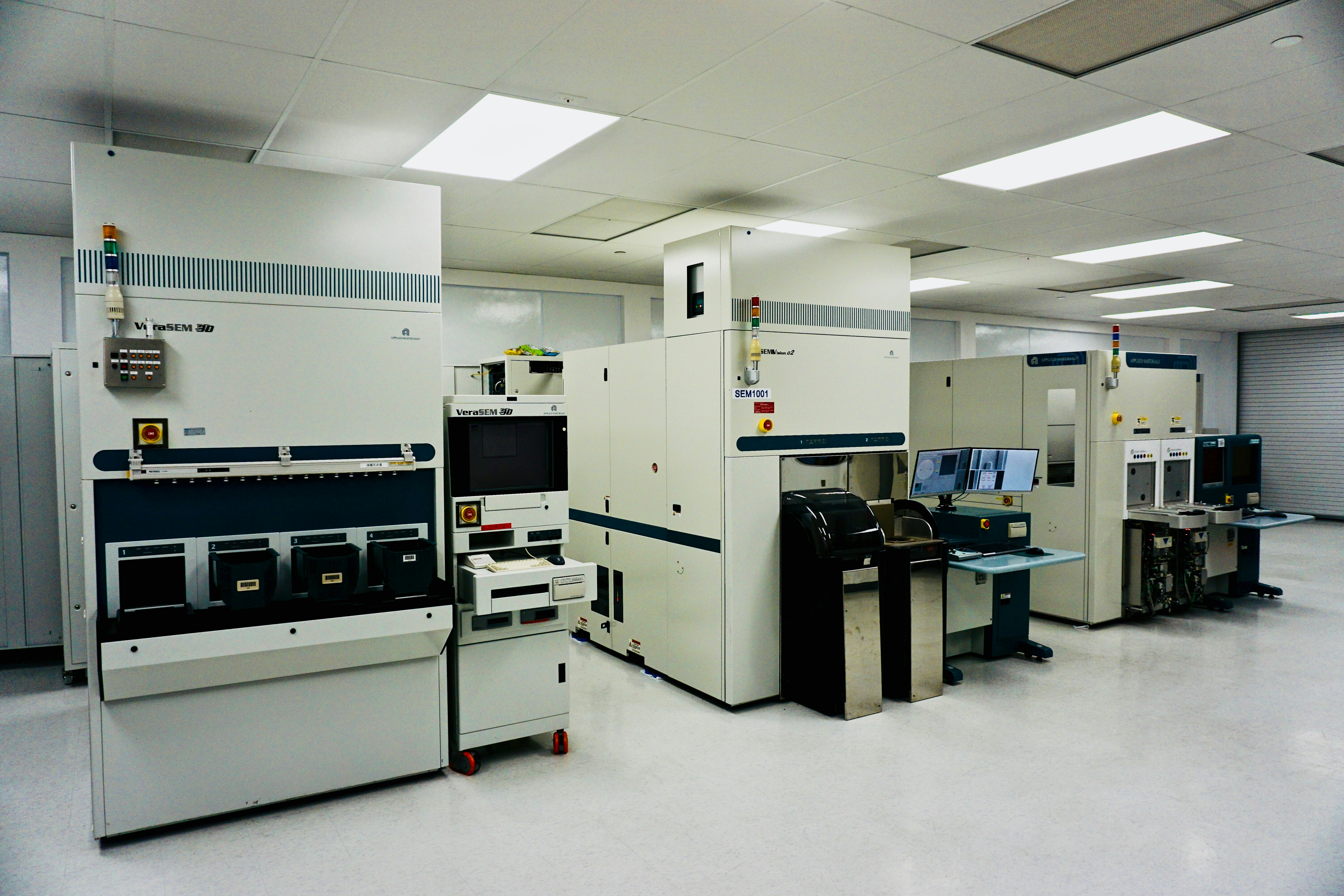 Semiconductor manufacturing clean room with yellow lighting and equipment