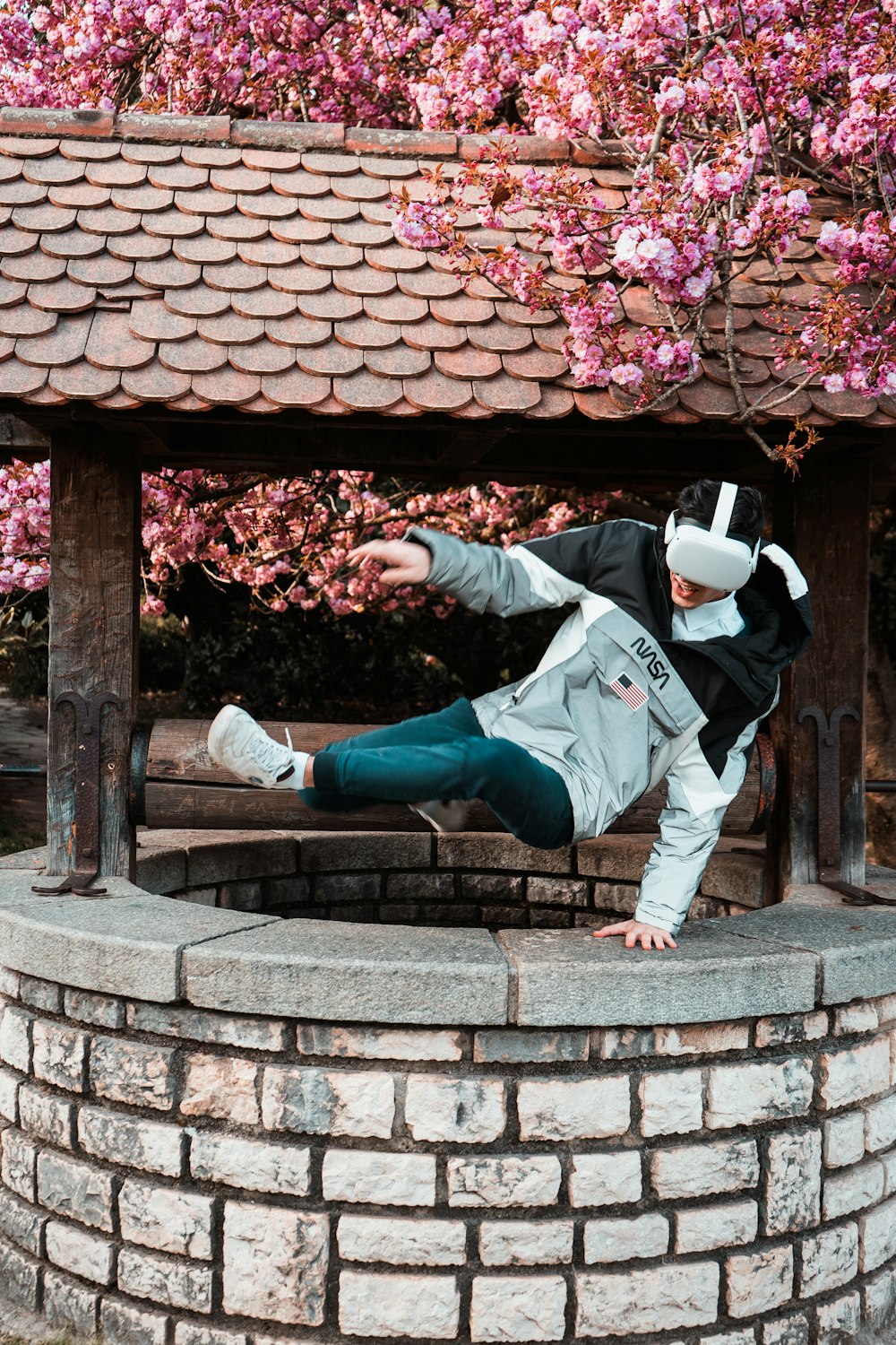 a man is doing a trick on a bench