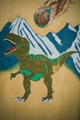 A vibrant t-rex shirt design featuring bold colors.
