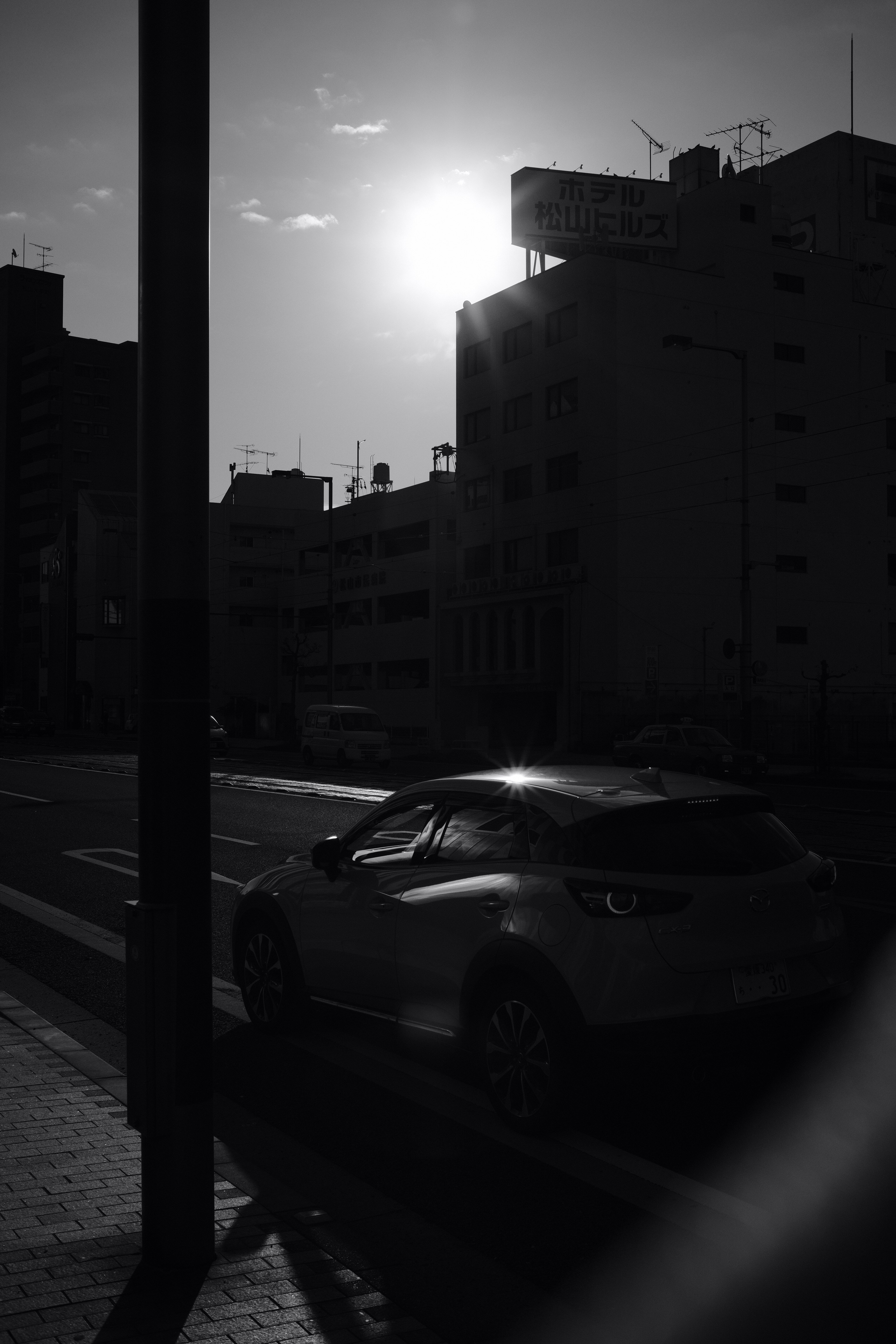 a car is parked on the side of the road
