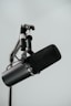 a microphone with a tripod attached to it