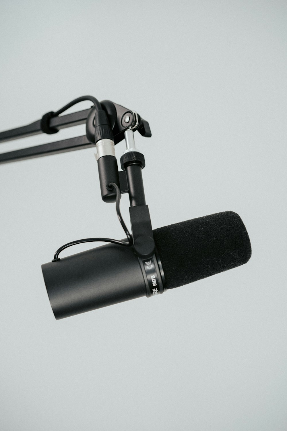 a microphone attached to a stand with a microphone attached to it