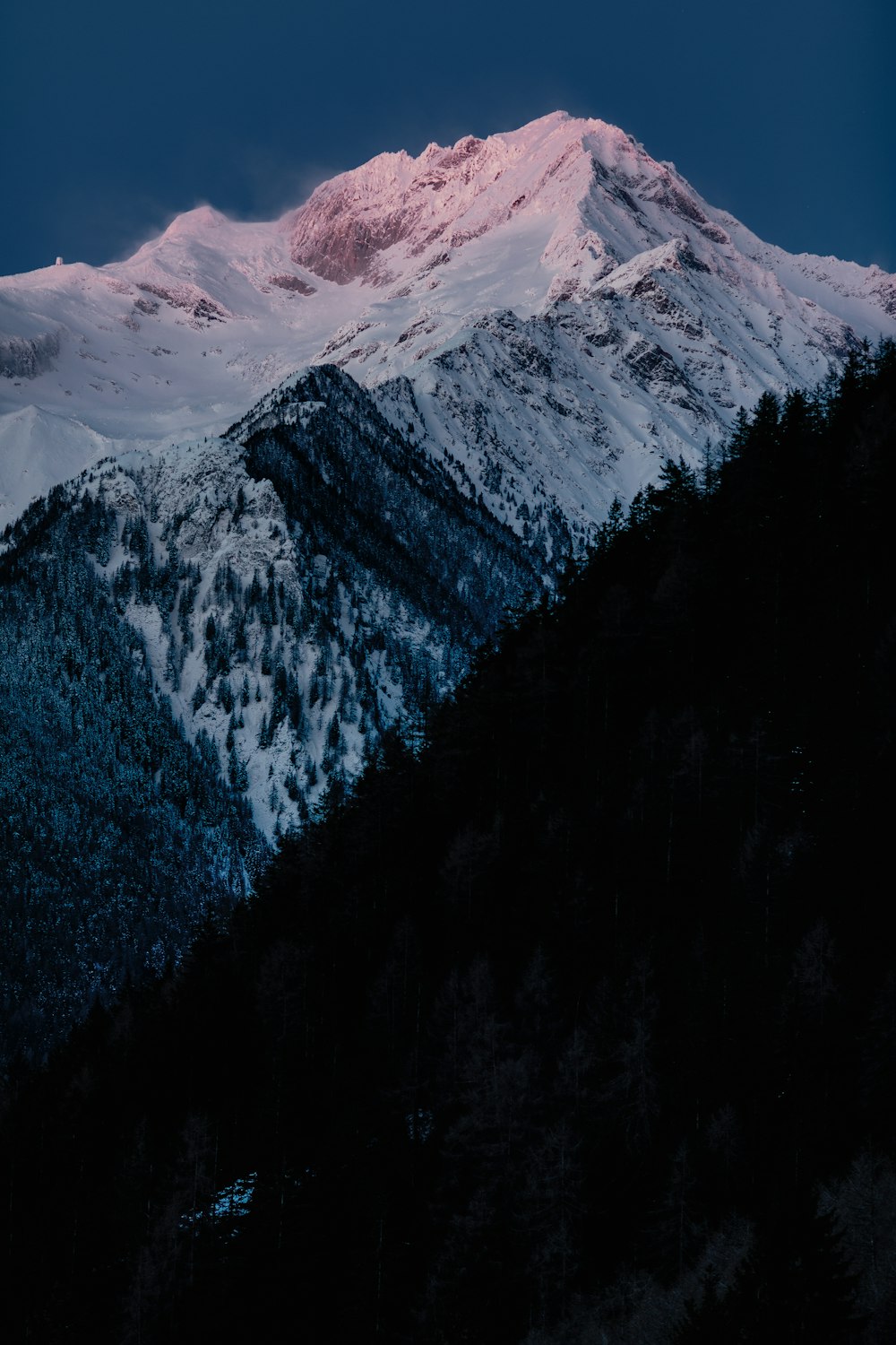 a view of a snow covered mountain
