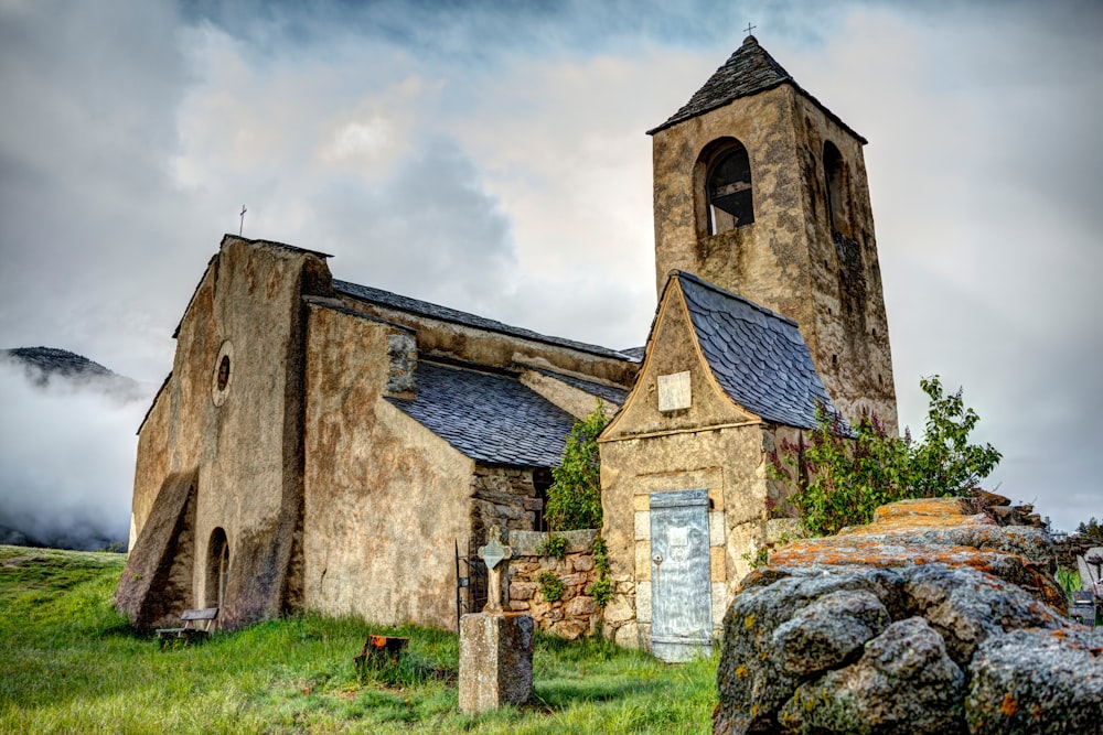 a stone building with a tower