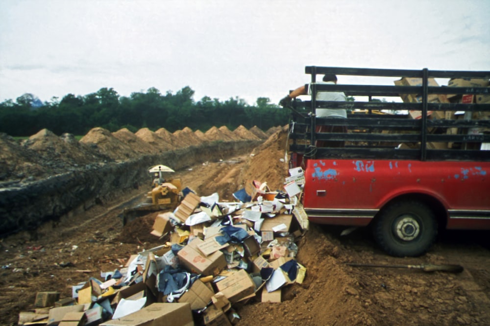 a truck with a pile of wood