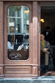 A family enjoying the view through a high-impact door.