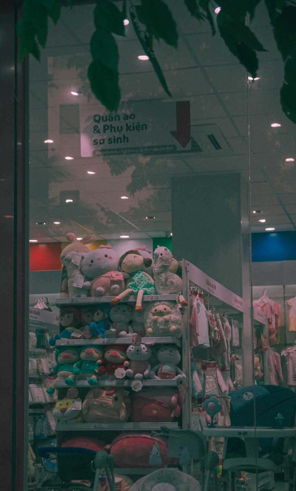 a store with a large display of stuffed animals