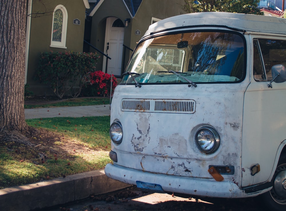 a white van parked on the side of a street