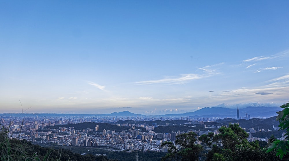 a city with mountains in the background